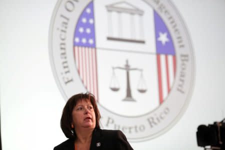 FILE PHOTO: Natalie Jaresko, Executive Director of the Federal Fiscal Control Board of Puerto Rico attends a meeting of the Financial Oversight and Management Board for Puerto Rico at the College of Engineers and Land Surveyors in San Juan, Puerto Rico October 31, 2017. REUTERS/Alvin Baez/File Photo