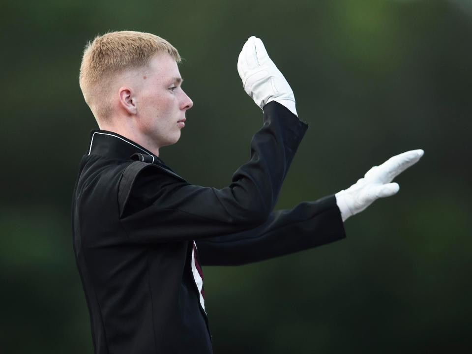 The Oak Ridge Marching Band drum major leads the national anthem before the start of the high school football game between Oak Ridge and Farragut on Friday, September 9, 2022 in Oak Ridge, TN. 