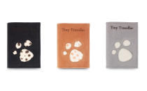 <p>This “Tiny Traveler” passport holder couldn’t be cuter. It comes in three colors (brown, grey, and black) and is made of a smooth, sturdy leather, sure to protect your little one’s passport!</p> <p><strong>To buy:</strong> <a rel="nofollow noopener" href="https://www.donsje.com/accessories/accessoires-all/passport-holder-cognac.html" target="_blank" data-ylk="slk:donsje.com;elm:context_link;itc:0;sec:content-canvas" class="link ">donsje.com</a>, $60.00</p>