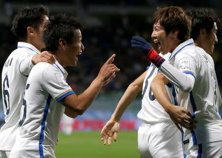 Football Soccer - Mamelodi Sundown v Kashima Antlers - FIFA Club World Cup Match 3 - Suita City Football Stadium, Suita, Osaka Prefecture, Japan - 11/12/16. Kashima Antlers' Yasushi Endo celebrates with teammates after scoring. REUTERS/Toru Hanai