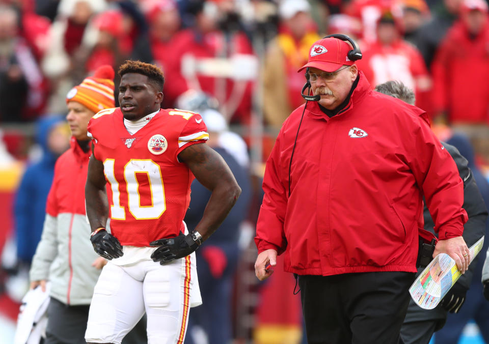 Kansas City Chiefs wide receiver Tyreek Hill (10) and head coach Andy Reid against the Houston Texans in the AFC Divisional Round playoff football game at Arrowhead Stadium. Mandatory Credit: Mark J. Rebilas-USA TODAY Sports