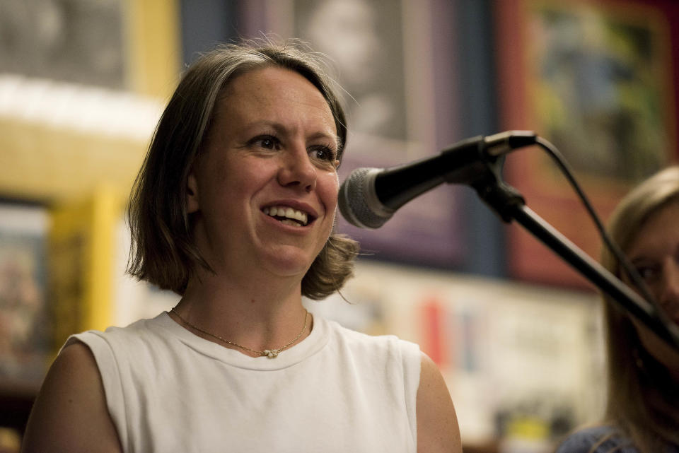 Hillary Frey introduces journalist Curtis Wilkie, who will interview Mayor Robyn Tannehill during the "What Makes Oxford Work" event at the Off Square Books store in Oxford.