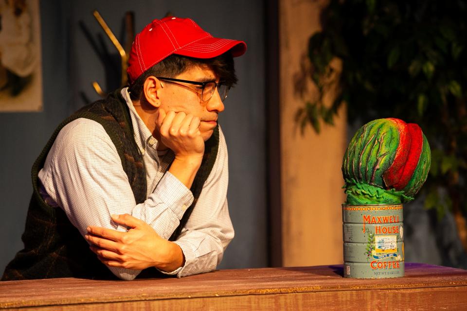 Christopher Salinas performs "Grow for Me" during a dress rehearsal of "Little Shop of Horrors" at Aurora Arts Theatre Thursday, July 20, 2023. Salinas plays the role of Seymour.