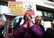 Supporters of WikiLeaks' founder Julian Assange gather outside Westminster Magistrates Court in London