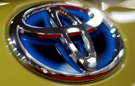 FILE PHOTO: The logo of Toyota is seen on a car during the Prague Autoshow in Prague