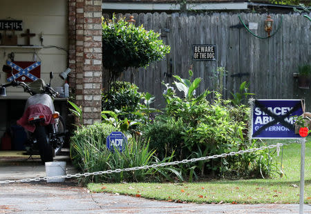 A Stacey Abrams yard sign with a black X in a yard close to Valdosta State University where the Democratic gubernatorial candidate for Georgia was speaking ahead of the midterm elections in Valdosta, Georgia, October 24, 2018. REUTERS/Lawrence Bryant