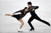 Figure Skating - Pyeongchang 2018 Winter Olympics - Ice Dance short dance competition - Gangneung Ice Arena - Gangneung, South Korea - February 19, 2018 - Tessa Virtue and Scott Moir of Canada perform. REUTERS/Damir Sagolj