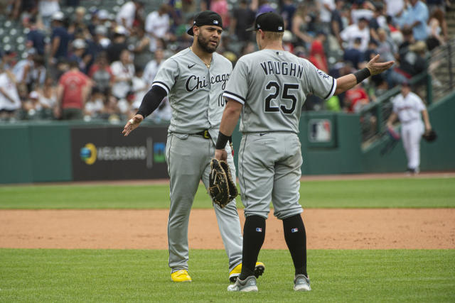 Chicago White Sox left fielder Eloy Jimenez, right, is congratulated by  center fielder Luis Robert after catching a fly ball hit by Cleveland  Guardians' Jose Ramirez during the sixth inning of a