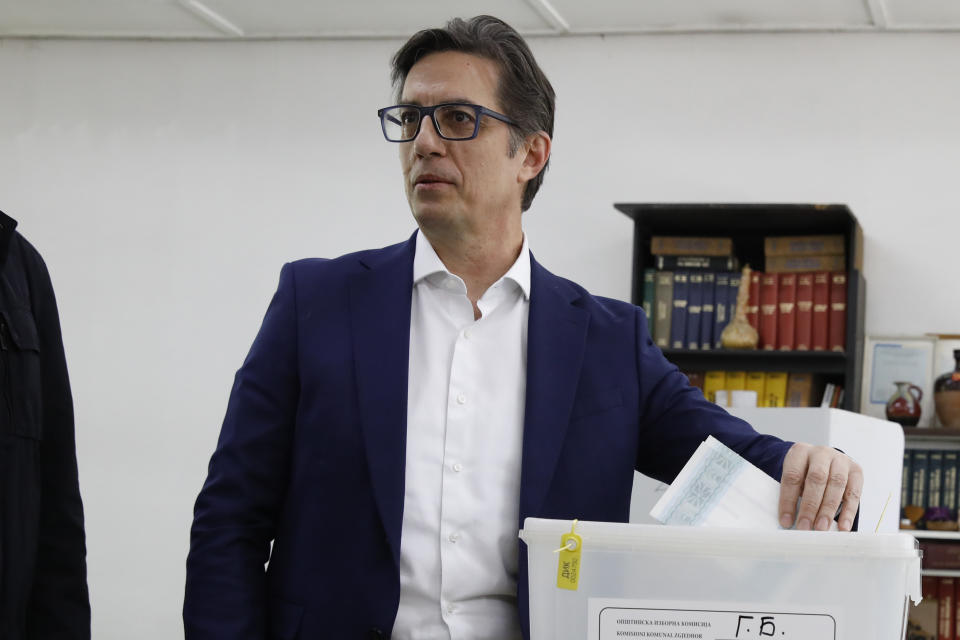 Stevo Pendarovski, incumbent President and a presidential candidate backed by the ruling social democrats (SDSM), casts his ballot in the first round of the presidential election, at a polling station in Skopje, North Macedonia, on Wednesday, April 24, 2024. People are lining up at pools to cast their votes in a peaceful atmosphere, hoping that the next president will be able to bring the country into the European Union. (AP Photo/Boris Grdanoski)