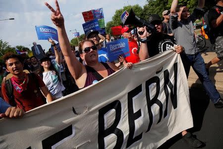 Protesters march against presumptive Democratic presidential nominee Hillary Clinton, ahead of the Democratic National Convention, in Philadelphia, Pennsylvania, U.S., July 24, 2016. REUTERS/Dominick Reuter