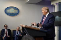 FILE - In this Wednesday, Aug. 12, 2020 file photo, President Donald Trump speaks at a news conference at the White House, in Washington. In a tweet on Thursday, Trump said the United Arab Emirates and Israel will establish diplomatic ties in deal halting planned annexation of occupied land sought by the Palestinians for their future state. It means the UAE, which is home to the cities of Dubai and Abu Dhabi, would become the first Gulf Arab state to have ties to Israel. Among Arab nations, only Egypt and Jordan have active diplomatic ties with Israel. (AP Photo/Andrew Harnik, File)