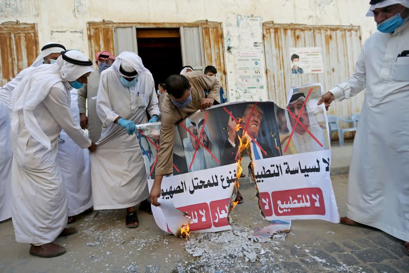 FILE PHOTO: Palestinians protest against Bahrain's move to normalise ties with Israel