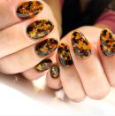 <p>"It isn't winter without tortoise shell nail art," says Masters. "This manicure is dark, and moody, and cozy all at the same time. It goes with everything and has so much depth." She explains that it isn't a design that's super accessible to novice nail artists because not many people have the tools and supplies to use for this. Instead, she recommends trying out press-ons — like the one she creates and sells <a href="https://nailthoughts.com/collections/custom-press-on-nails/products/tortoise-shell-press-on-nails" rel="nofollow noopener" target="_blank" data-ylk="slk:on her website;elm:context_link;itc:0;sec:content-canvas" class="link ">on her website</a> — if you're not comfortable going back to the salon yet.Birkett-Leigh adds, "Animal print is the gift that keeps on giving as a nail professional. It seems that it has become a staple design, that can also be created in many different colors and materials. Gone are the days of simple leopard print — which is still very popular, to be honest — but we are now seeing tortoise, cow, poisonous tree frog, and python. The list goes on and on."She has been seeing a more modern twist on popular prints: Incorporating negative space and deconstructed prints are all on the rise. These looks can be created in any color palette so they can match any aesthetic. </p><p><a href="https://www.instagram.com/p/B4sLWJOFEEP/" rel="nofollow noopener" target="_blank" data-ylk="slk:See the original post on Instagram;elm:context_link;itc:0;sec:content-canvas" class="link ">See the original post on Instagram</a></p>