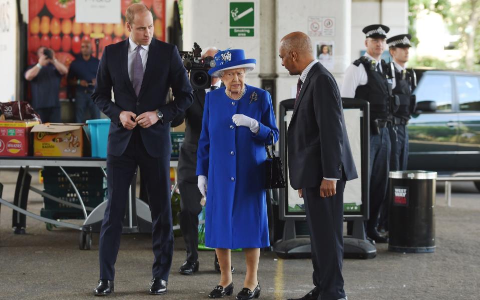 Queen Elizabeth II and the Duke of Cambridge at the Westway Sports Centre - Credit: David Mirzoeff