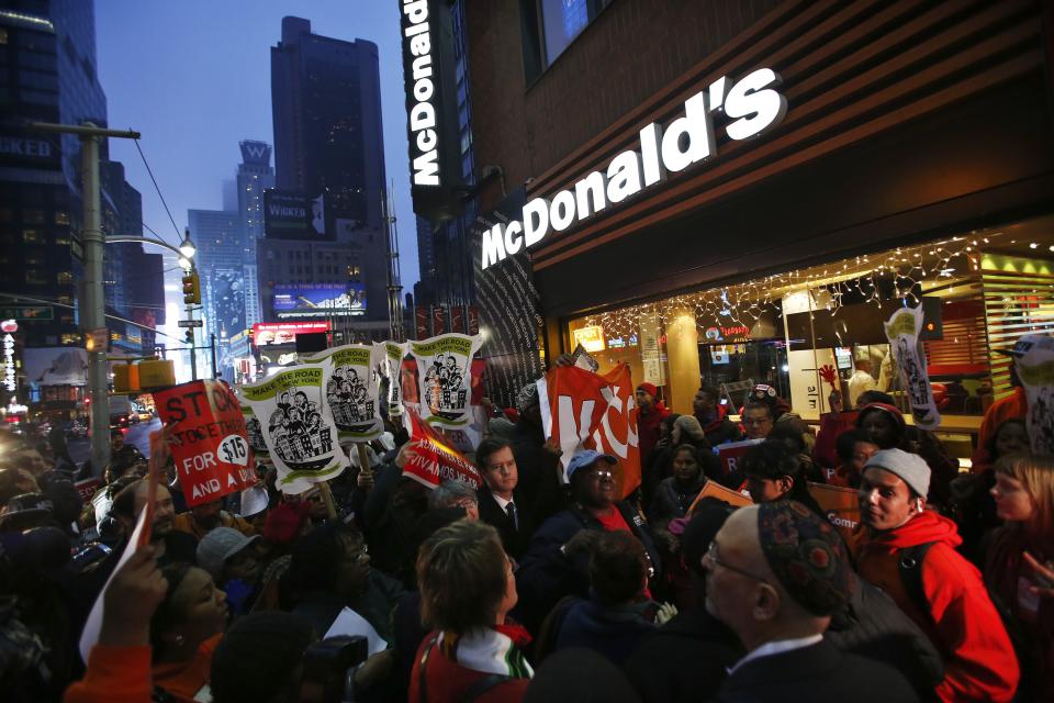 Fast food workers attend a protest against McDonald's outside of one of its restaurants in New York, December 5, 2013. (REUTERS/Eduardo Munoz)