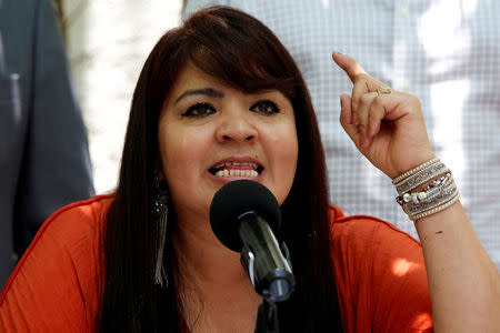 FILE PHOTO: Former Olinala community police leader and Senate candidate of the National Regeneration Movement (MORENA) Nestora Salgado speaks during a news conference in Mexico City, Mexico in May 22, 2018. REUTERS/Ginnette Riquelme/File Photo