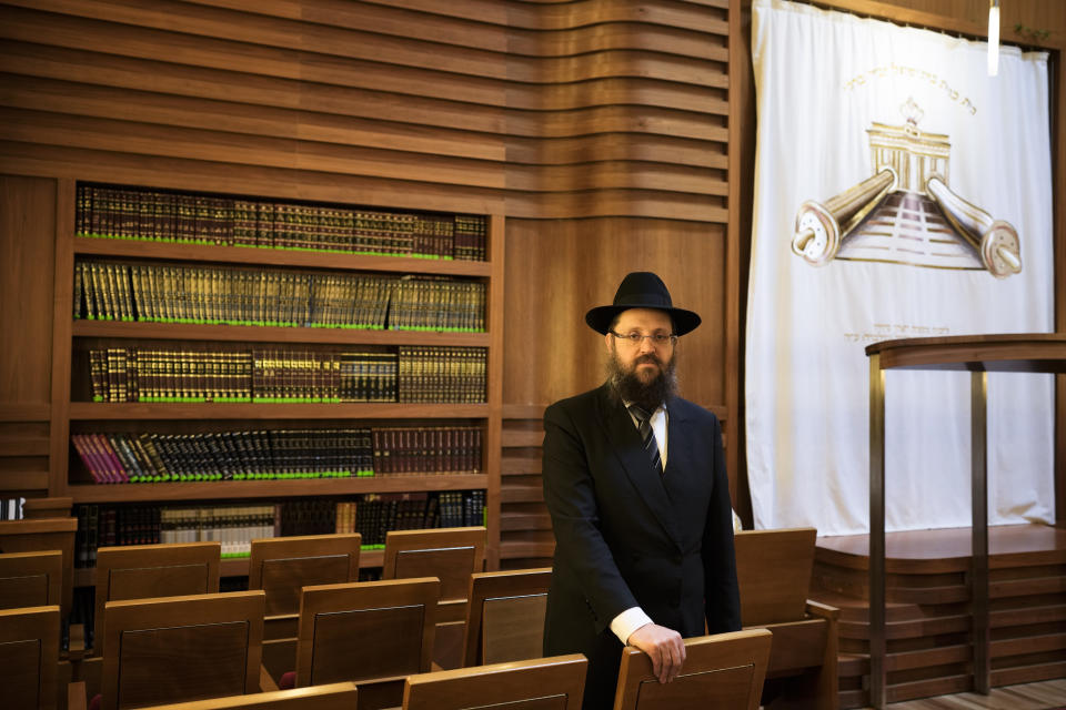 Rabbi Yehuda Teichtal poses for a portrait at the synagogue of the Chabad community prior to the first Shabbat service after the Hamas attacks on Israel in Berlin, Germany, Friday, Oct. 13, 2023. (AP Photo/Markus Schreiber)