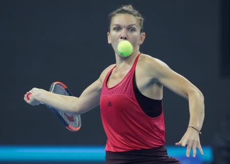 Tennis - China Open - Women's Singles Finals - Beijing, China - October 8, 2017 - Simona Halep of Romania in action against Caroline Garcia of France. REUTERS/Jason Lee