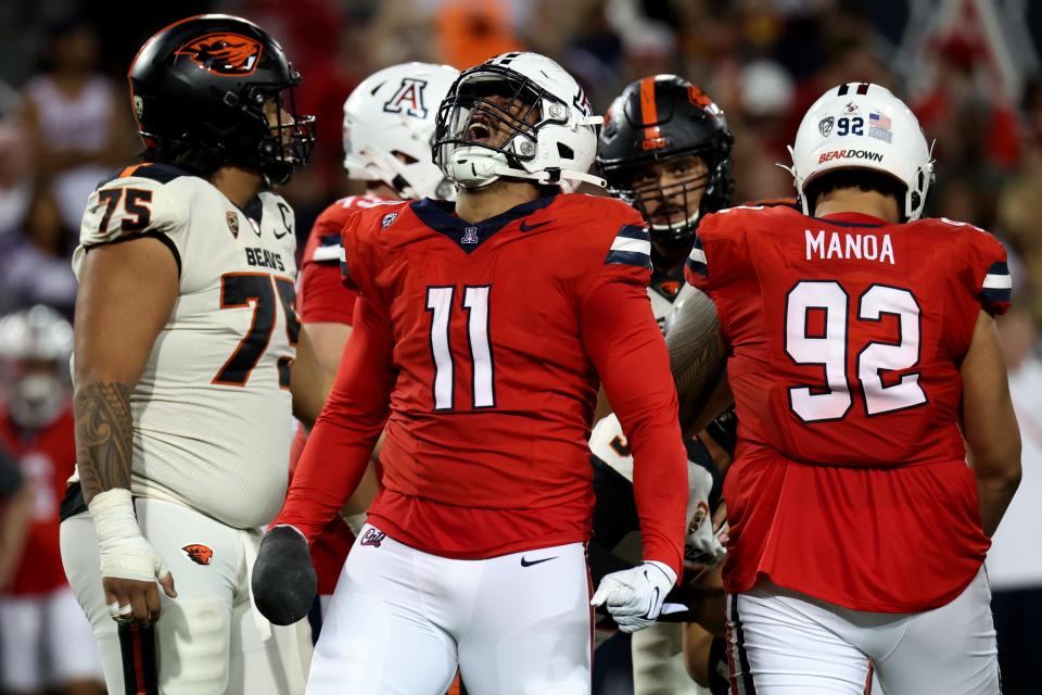 Arizona linebacker Taylor Upshaw celebrates a tackle for a loss against Oregon State.