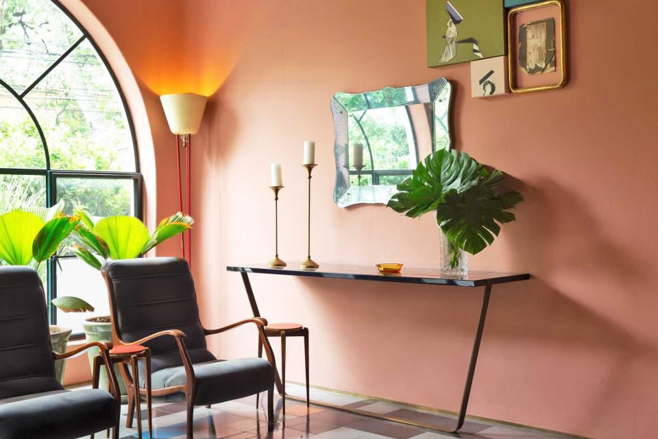 A seating area in the lobby at Casa Habita hotel