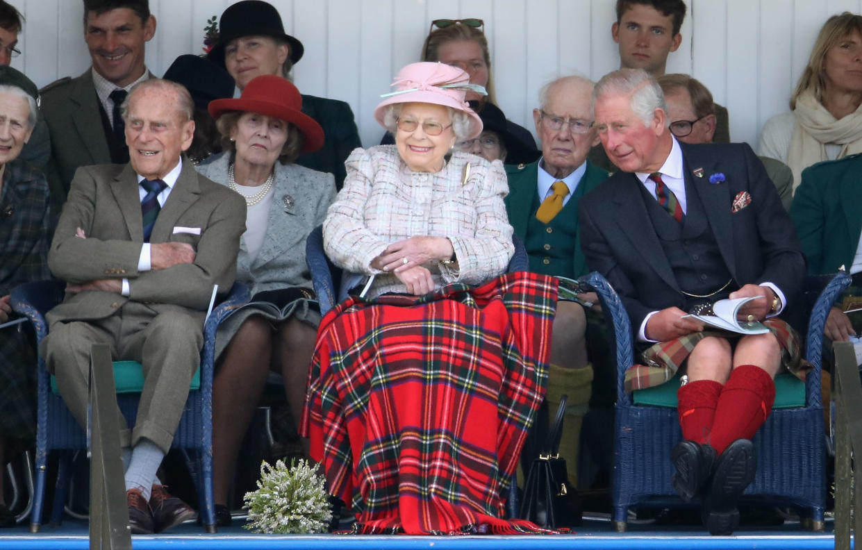 BRAEMAR, SCOTLAND - SEPTEMBER 02:  Queen Elizabeth II, Prince Philip, Duke of Edinburgh and Prince Charles, Prince of Wales watch the 2017 Braemar Gathering at The Princess Royal and Duke of Fife Memorial Park on September 2, 2017 in Braemar, Scotland.  (Photo by Chris Jackson/Getty Images)