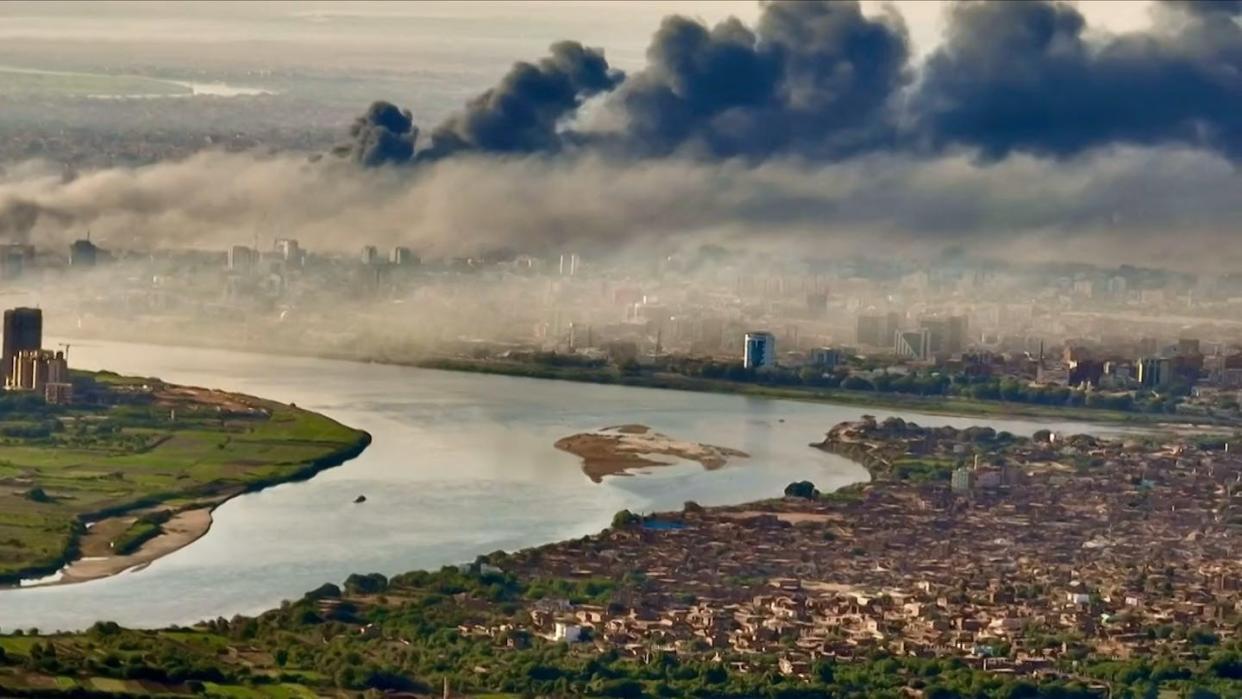 Smoke rises from Sudan's capital as conflict grips Khartoum. Abdelmoneim Sayed/AFP via Getty Images