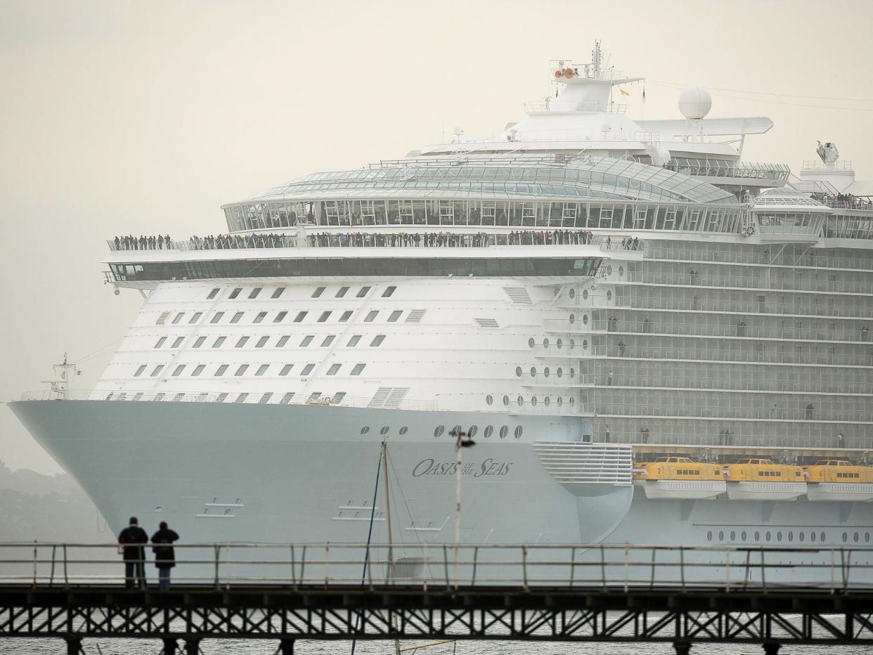 The world's largest cruise ship, MS Oasis of the Seas, owned by Royal Caribbean, makes her way up Southampton Water into Southampton where she will stay for a day before heading to the US