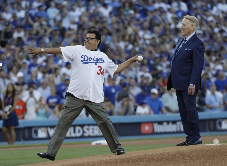 <p>Vin Scully and Fernando Valenzuela throw out the ceremonial first pitch before Game 2 of baseball’s World Series between the Houston Astros and the Los Angeles Dodgers Wednesday, Oct. 25, 2017, in Los Angeles. (AP Photo/David J. Phillip) </p>