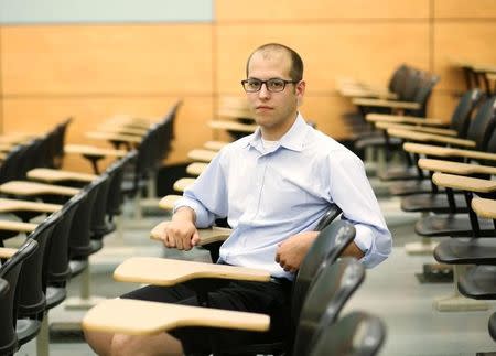 Jason Thieman sits in a lecture hall at the Purdue University Physics building, in Layfayette, Indiana, July 20, 2016. REUTERS/Chris Bergin