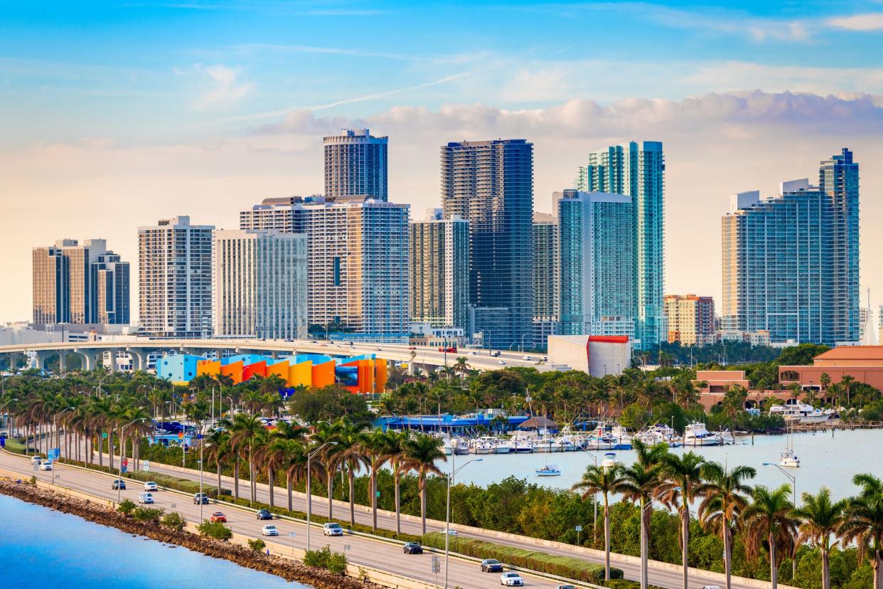 Miami, Florida, USA downtown skyline over MacAurther Causeway in the afternoon.