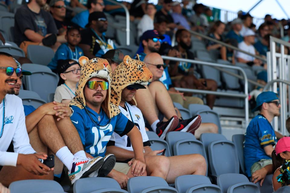 Doug Speed watches the first Jaguars training camp practice on July 26 in the Miller Electric Center.