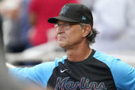 Miami Marlins manager Don Mattingly looks out from the dugout before a baseball game against Atlanta Braves, Friday, May 27, 2022, in Atlanta, Ga. (AP Photo/John Bazemore)