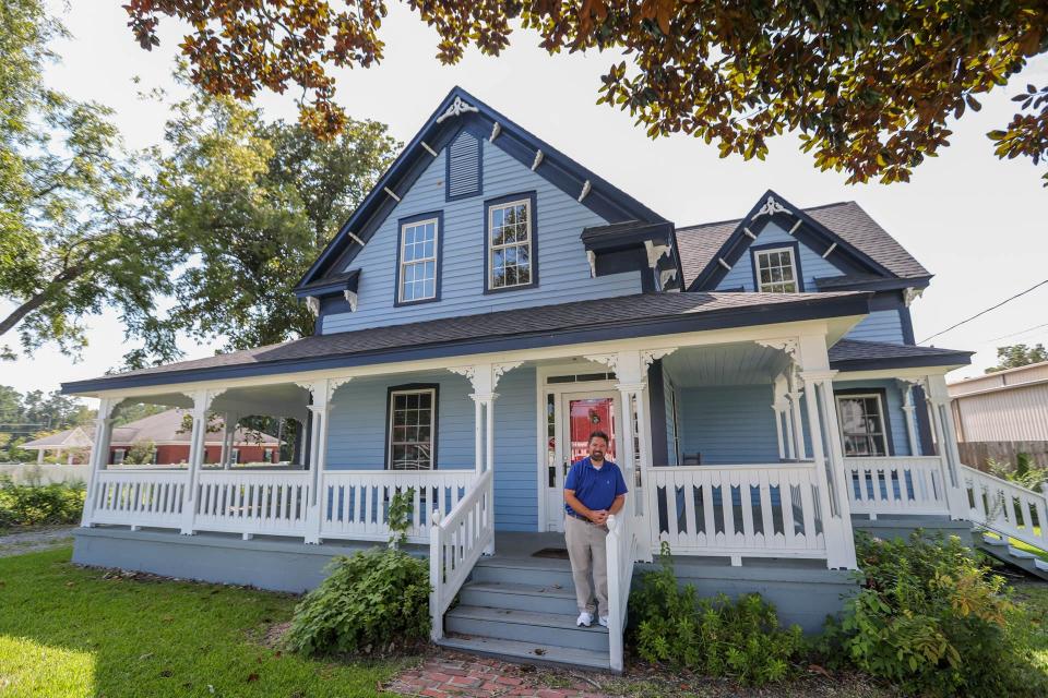 Guyton Mayor Russ Deen stands on the steps of a home he had restored in historic downtown Guyton.