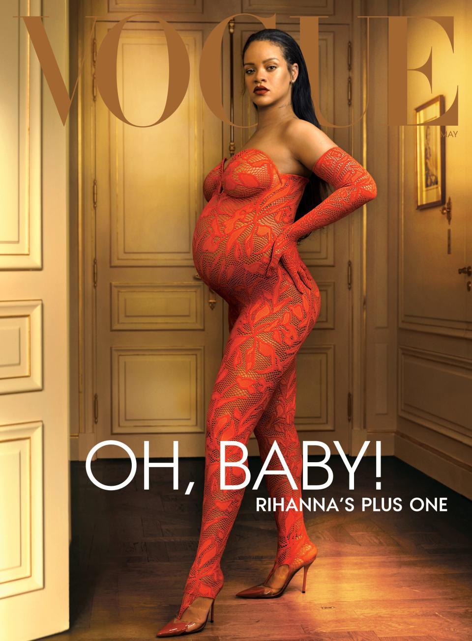Rihanna and her baby bump grace the cover of Vogue's May issue in a red lace bodysuit.