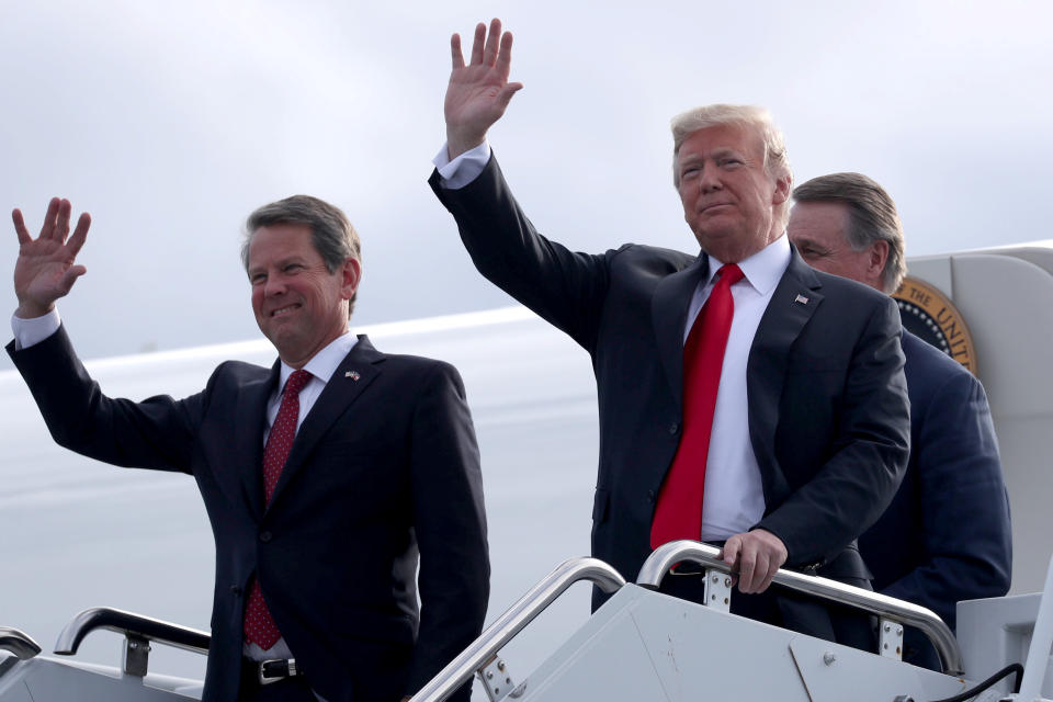 U.S. President Donald Trump and republican candidate for Georgia governor Brian Kemp arrive to attend a campaign rally at Middle Georgia Regional Airport in Macon, Georgia, U.S., November 4, 2018. REUTERS/Jonathan Ernst