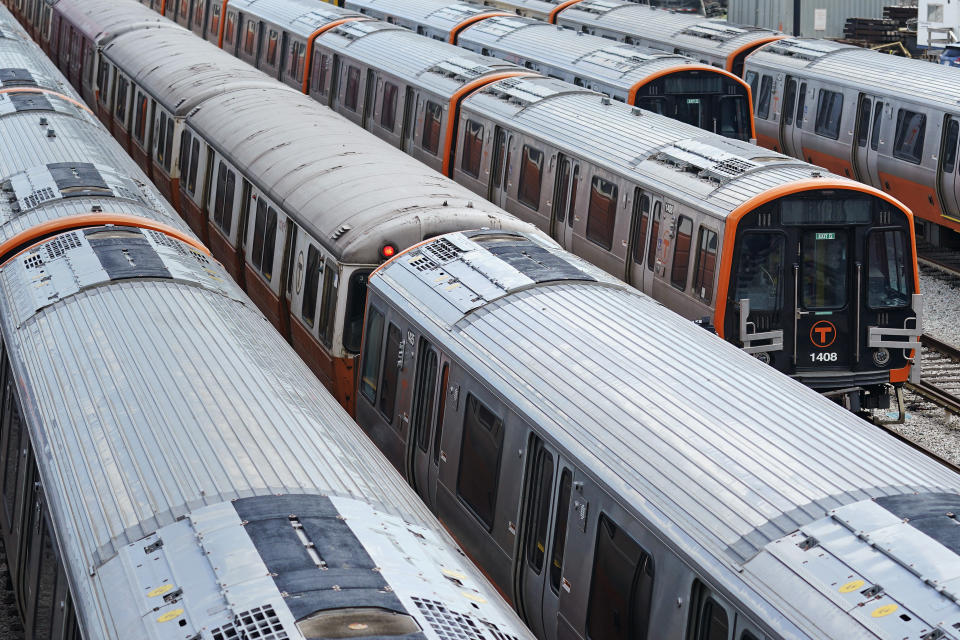 A selection of old and new subway cars are parked at the Orange Line's Wellington Station train yard, Wednesday, July 13, 2022, in Medford, Mass. Boston's public transit system is a mess, harried commuters and officials are increasingly looking to a Chinese-owned subway car manufacturer to account for some of the troubles. There have been fatal accidents, subway car collisions, malfunctioning elevators, and trains running on weekend schedules during rush hour. (AP Photo/Charles Krupa)