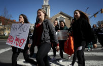 <p>Students from Washington-Lee High School join the National School Walkout while making their way to the U.S. Capitol April 20, 2018 in Arlington, Virginia. (Photo: Win McNamee/Getty Images) </p>