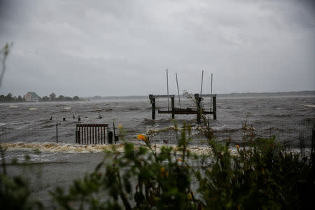 Water from Neuse River floods houses as Hurricane Florence comes ashore in New Bern, North Carolina, U.S., September 13, 2018. REUTERS/Eduardo Munoz