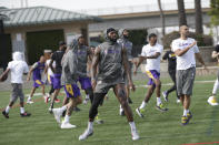 Los Angeles Lakers forward LeBron James joins team members during NBA basketball training outdoors in El Segundo, Calif., Thursday, Jan. 30, 2020. The Lakers held their second practice Thursday, while they continue to grieve for former player Kobe Bryant. (AP Photo/Damian Dovarganes)