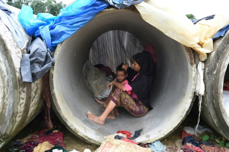 Rohingya Muslim refugees shelter in cement pipes at Kutupalong refugee camp in the Bangladeshi district of Ukhia on September 20, 2017