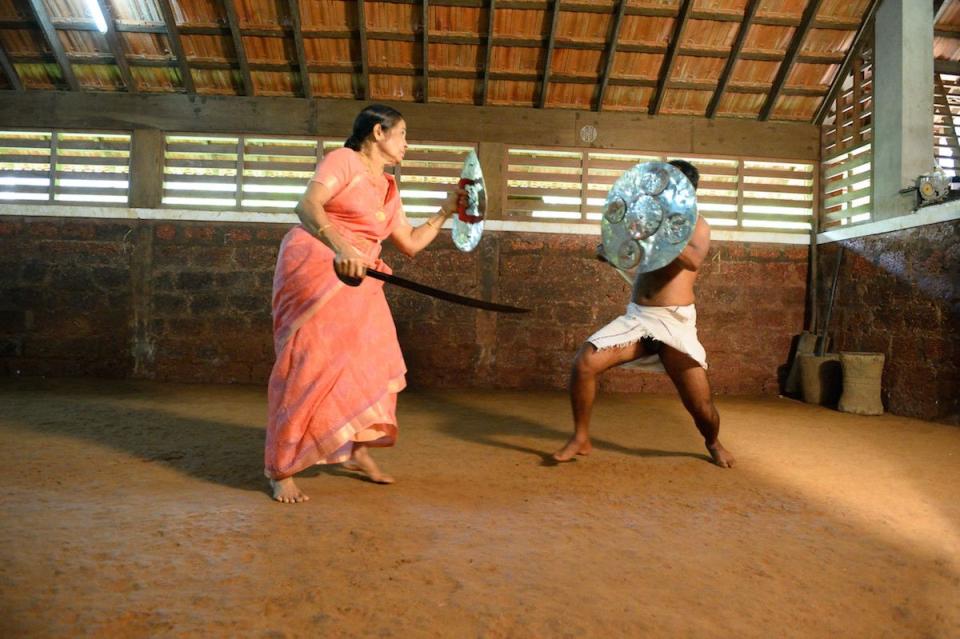 <p>Meenakshi Raghavan, a 74-year-old grandmother, sparred with a student in Kerala, India, in September 2016. Raghavan, who studied martial arts for 66 years, teaches young women and girls self-defense. </p>