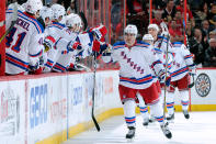 OTTAWA, CANADA - APRIL 23: Chris Kreider #20 of the New York Rangers celebrates his second period goal with teammates in Game Six of the Eastern Conference Quarterfinals against the Ottawa Senators during the 2012 NHL Stanley Cup Playoffs at the Scotiabank Place on April 23, 2012 in Ottawa, Ontario, Canada. The Rangers defeated the Senators 3-2. (Photo by Richard Wolowicz/Getty Images)