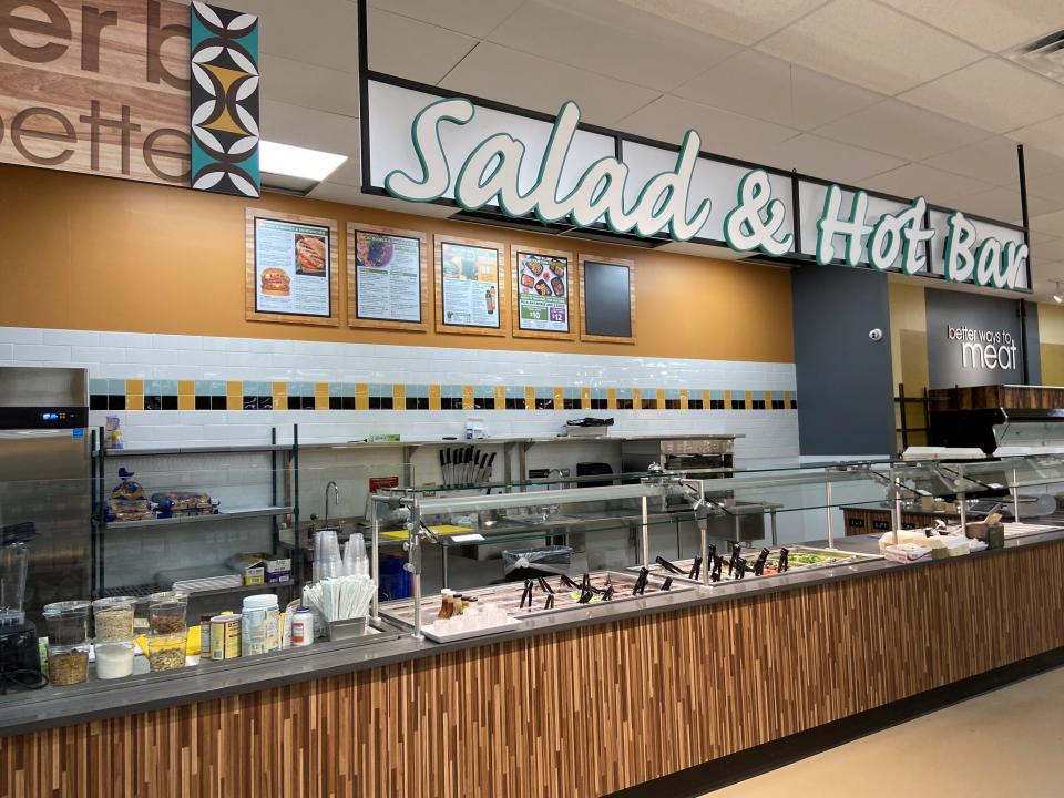 Inside the new Better Health Market & Cafe in Dearborn there is a salad bar with organic produces and a hot bar.
