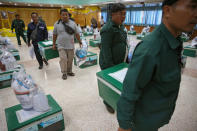 Bangkok district officers prepare ballot boxes and other documents ahead of the general election at a local district office in Bangkok, Thailand, March 23, 2019. REUTERS/Athit Perawongmetha