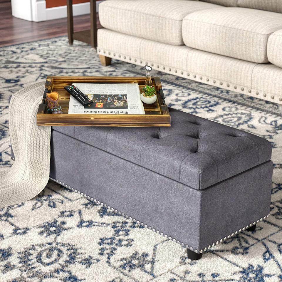 To keep your coffee table clutter-free, this rustic tray has enough room for remotes, magazines and small succulents. Plus, you can use it for breakfast in bed. <a href="https://amzn.to/3o9Q9b5" target="_blank" rel="noopener noreferrer">Find it for $35 at Amazon</a>.