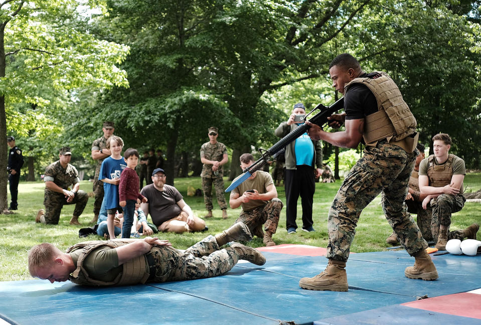 <p>Members of the U.S. Marine Corps (USMC) demonstrate their fighting skills in Brooklyn’s Prospect Park as part of Fleet Week on May 27, 2017 in New York City. At “Marines Day” in the park members of the public had the opportunity to test their strength on chin-up bars, hold military weapons and watch as Marines display their fighting skills.Now in its 29th year, Fleet Week brings more than 3,700 U.S. and Canadian service members to Manhattan through Memorial Day. The event includes ship tours, military demonstrations, musical performances and other events. (Photo: Spencer Platt/Getty Images) </p>