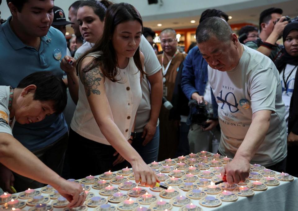 PHOTO: Family members of the missing Malaysia Airlines flight MH370 light candles during a remembrance event marking the 10th anniversary of its disappearance, in Subang Jaya, Malaysia March 3, 2024. (Hasnoor Hussain/Reuters)