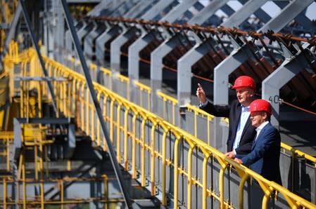 FILE PHOTO: German Finance Minister Scholz and Brandenburg State Premier Woidke visit the former mine overburden conveyor bridge F60 in Lichterfeld-Schacksdorf