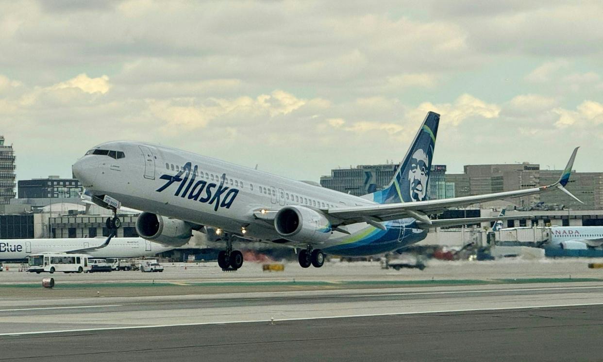 An Alaska airlines Boeing 737 is taking off from Los Angeles International AirPort (LAX) in Los Angeles, California, on March 6, 2024. (Photo by Daniel SLIM / AFP) (Photo by DANIEL SLIM/AFP via Getty Images) ORIG FILE ID: 2056666360