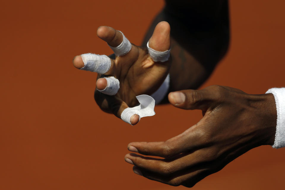 FLE - In this June 4, 2014, file photo, France's Gael Monfils tapes his fingers at the start of his quarterfinal match of the French Open tennis tournament against Britain's Andy Murray at Roland Garros stadium, in Paris. (AP Photo/Darko Vojinovic, File)